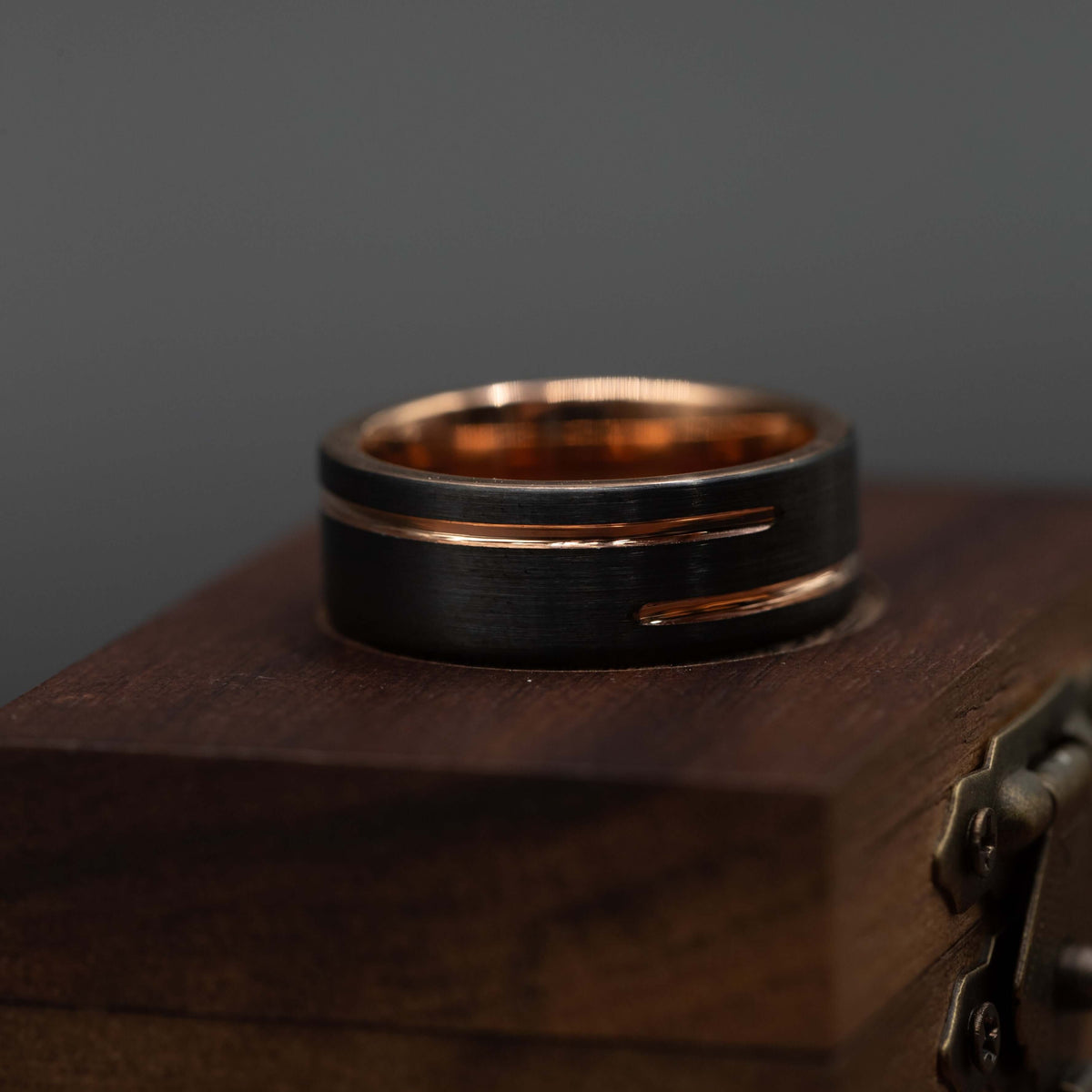 Men's 8mm Black & Rose Gold Wedding Band with Unique Offset Channel