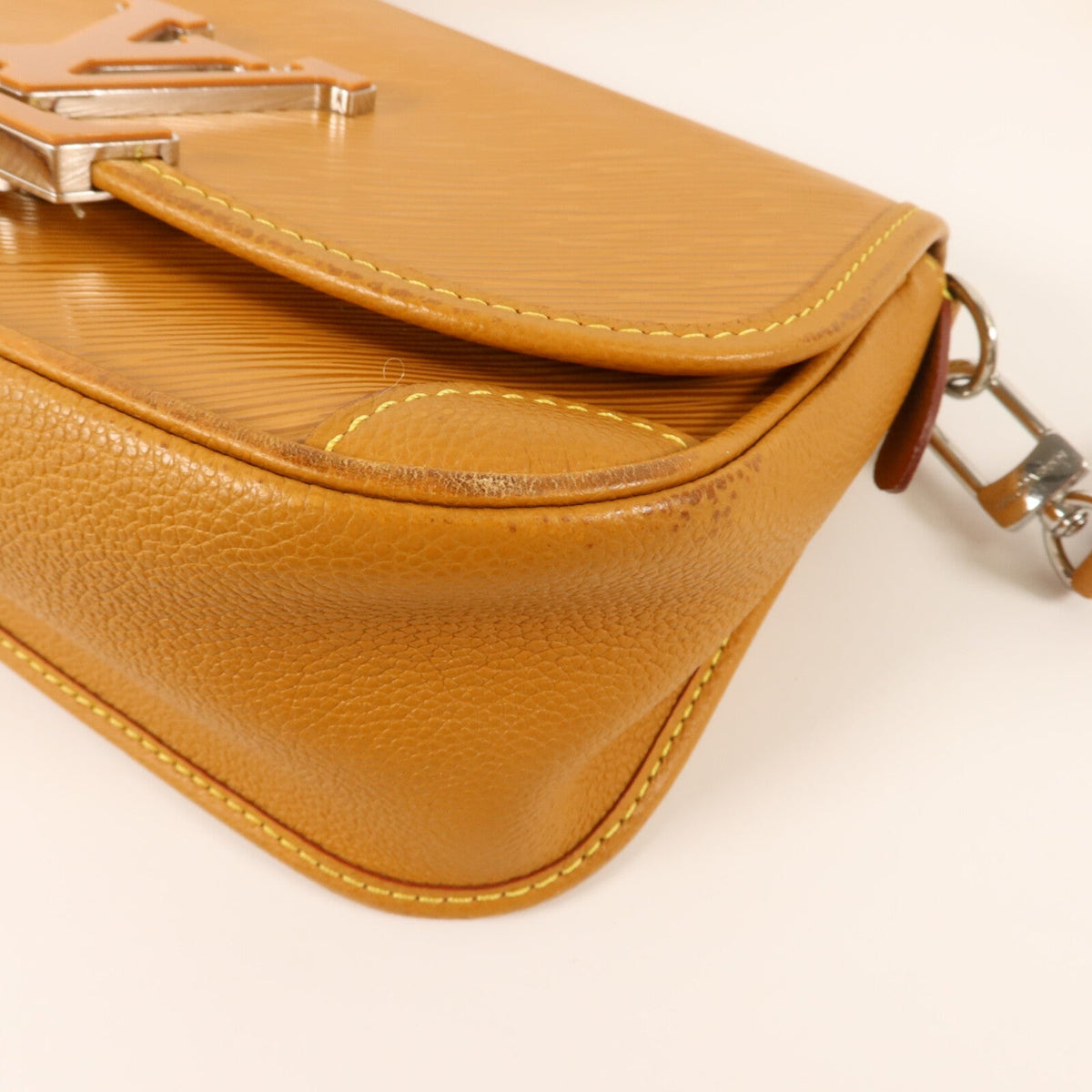 Louis Vuitton Buci · Epi Leather