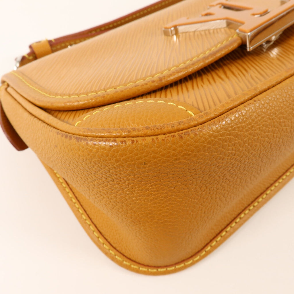 Louis Vuitton Buci · Epi Leather