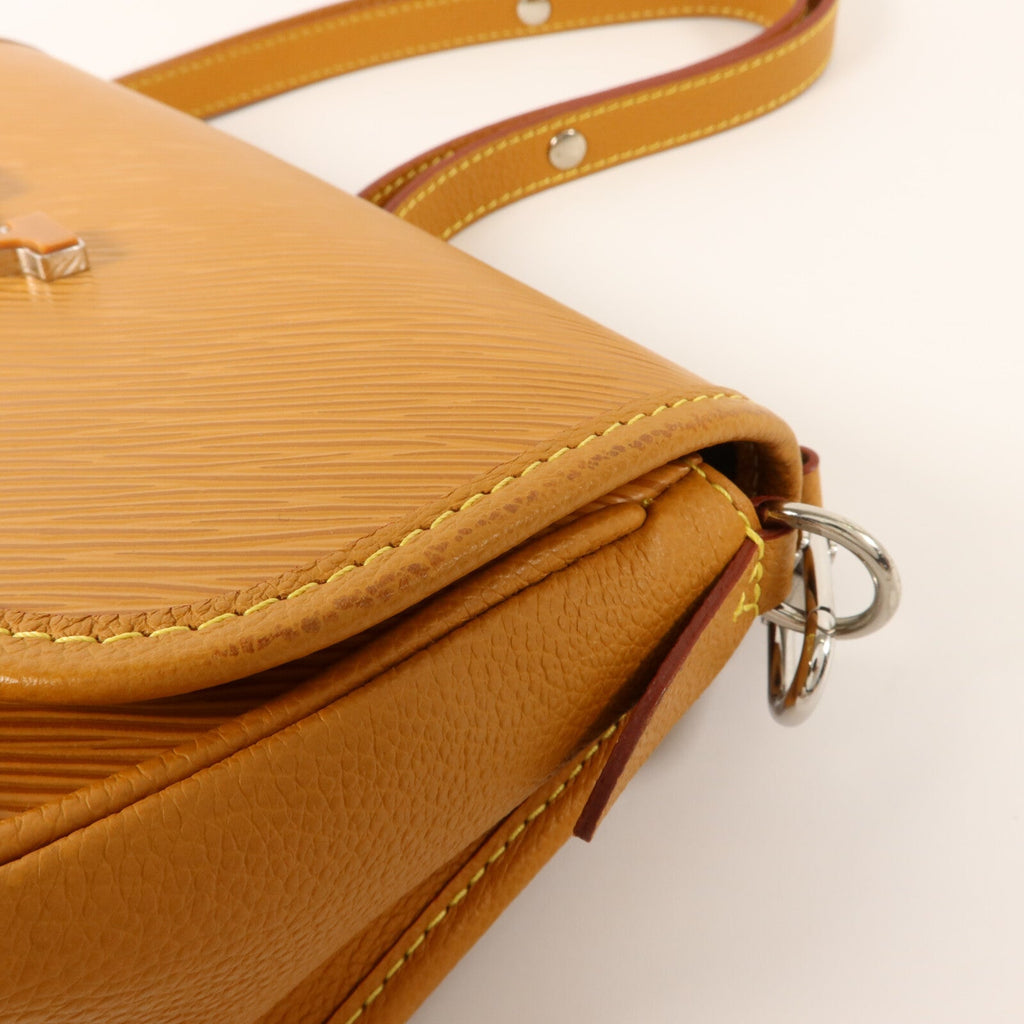 Louis Vuitton Buci · Epi Leather