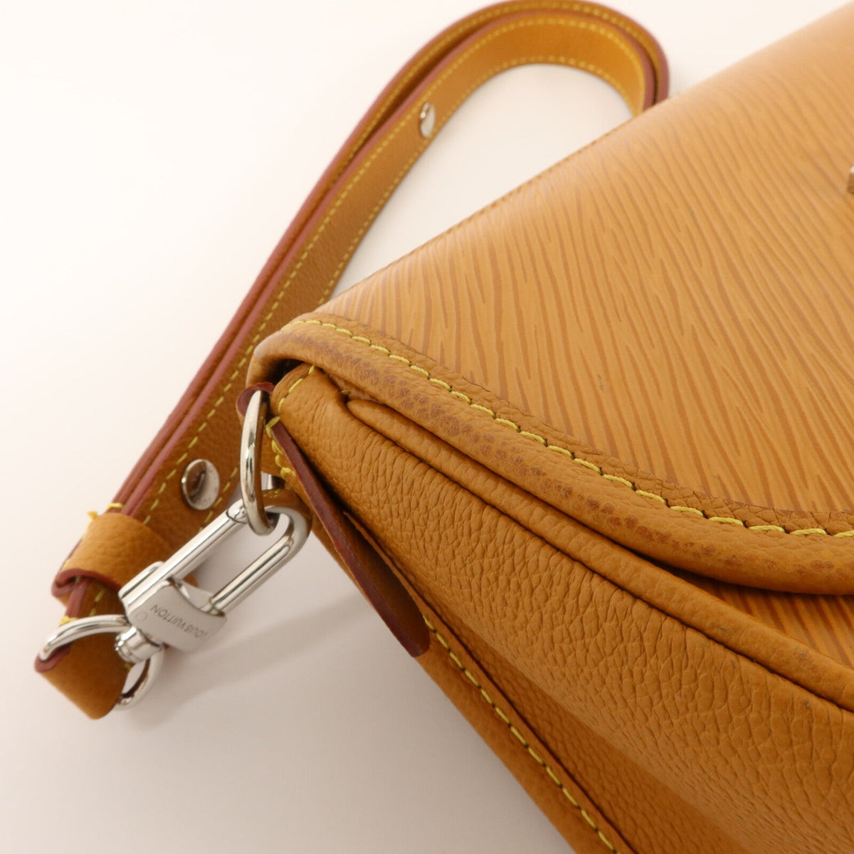 Louis Vuitton Buci · Epi Leather