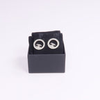 Chanel CC Earrings · Metal
