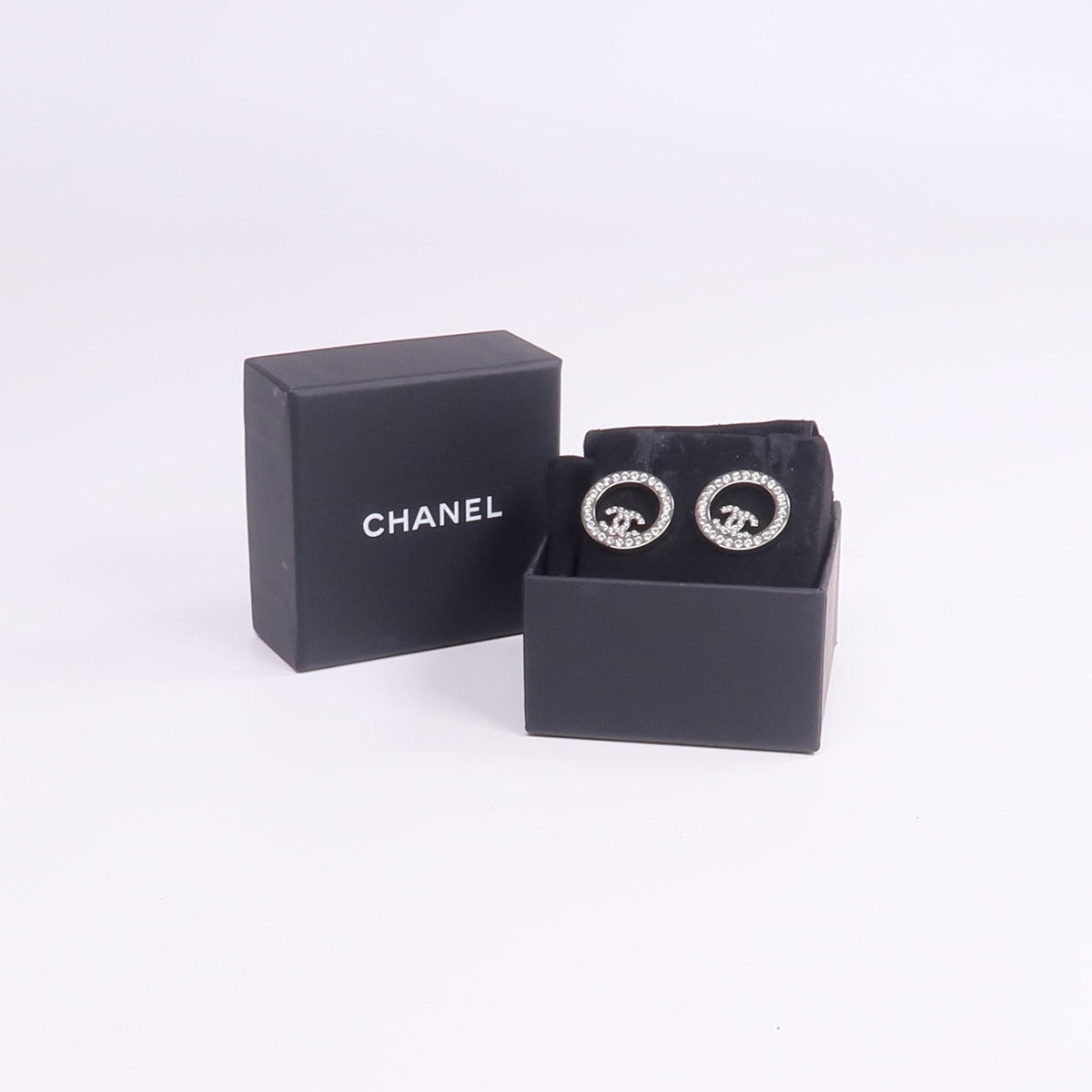 Chanel CC Earrings · Metal