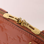 Louis Vuitton Alma BB · Monogram Vernis