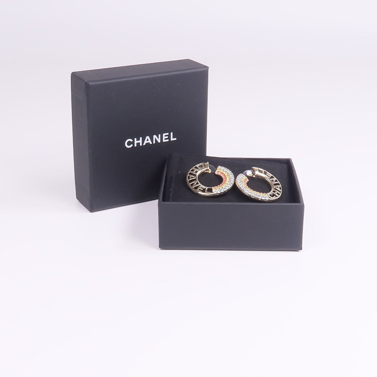 Chanel CC Earrings · Metal