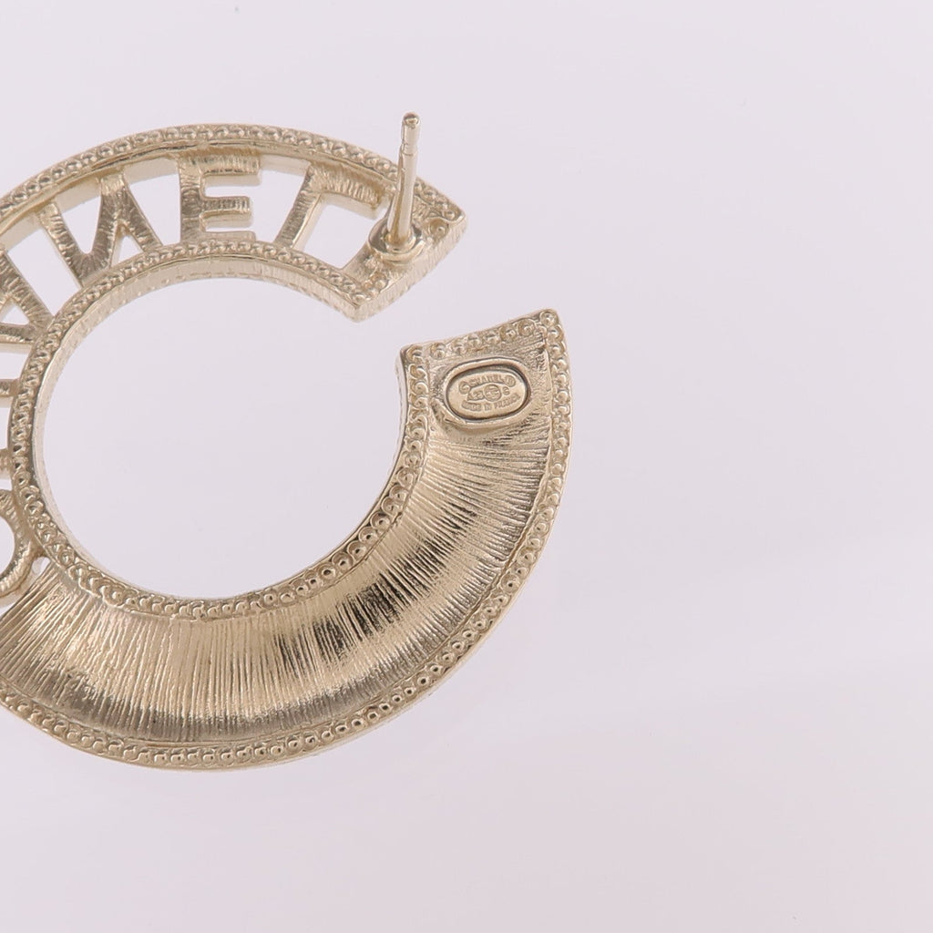Chanel CC Earrings · Metal