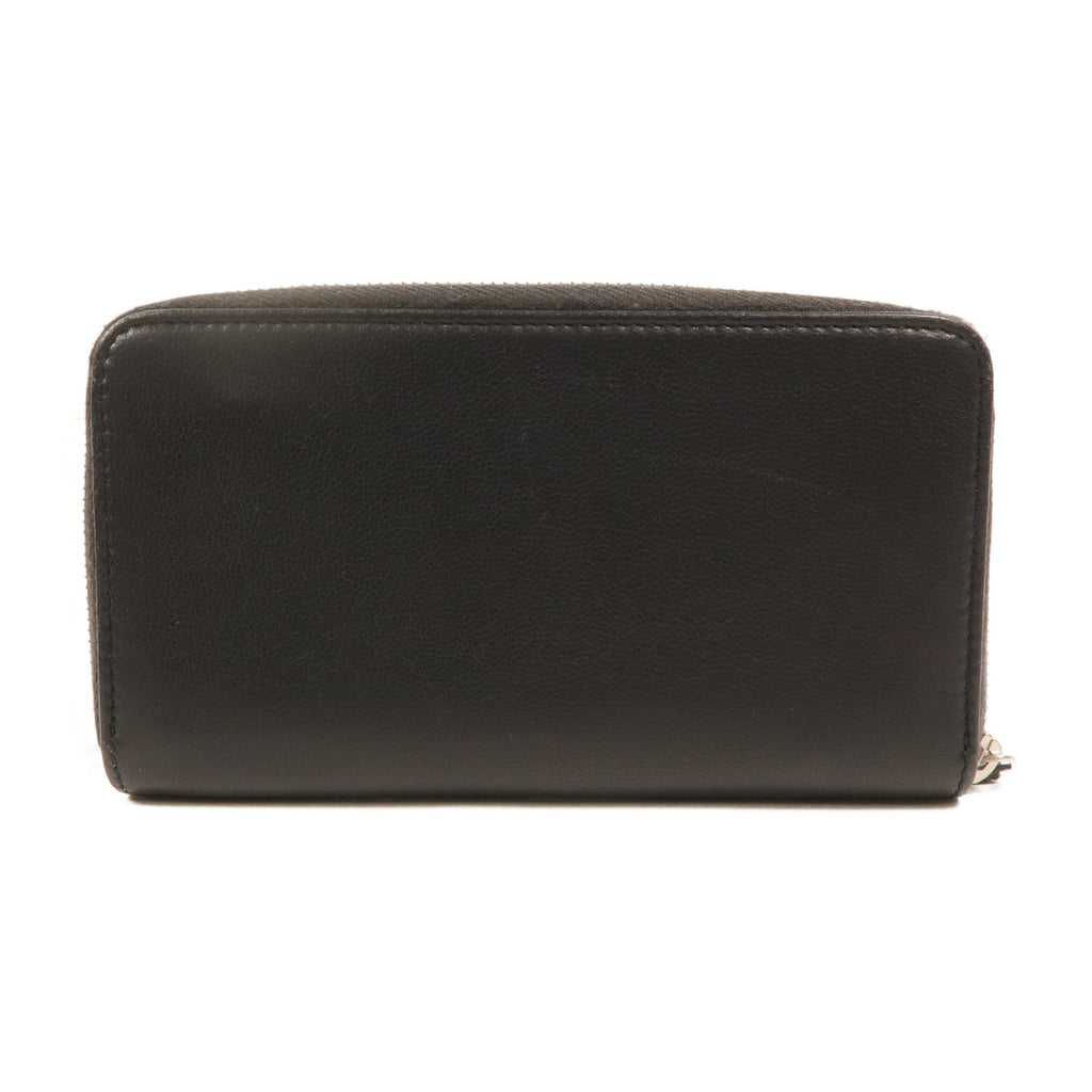 Chanel Studded CC · Zip Wallet · Lambskin