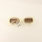 Chanel CC Oval Sunglasses · Gold Hardware