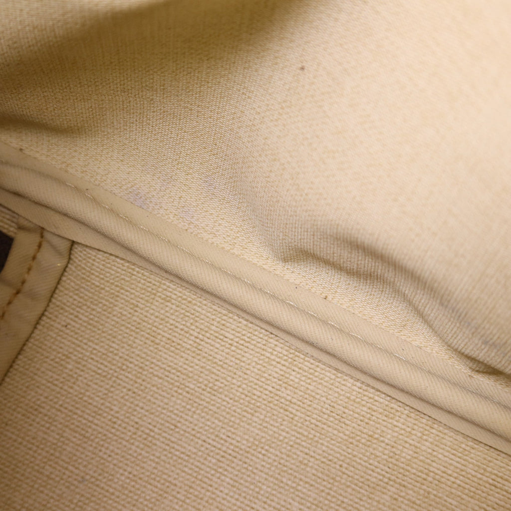 Louis Vuitton Excursion · Monogram Canvas