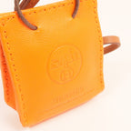 Hermès Sac Orange Charm · Milo Swift