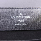 Louis Vuitton Lock Me · Calfskin Backpack