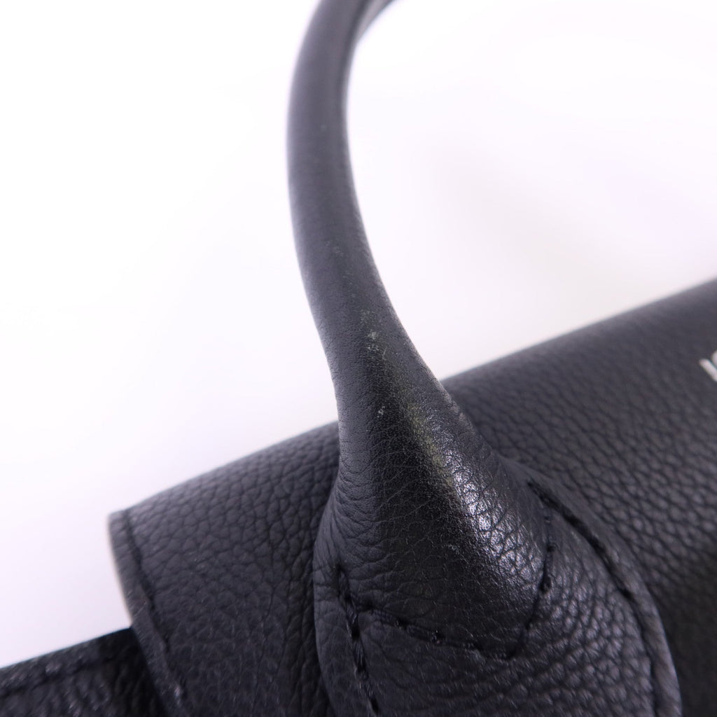 Louis Vuitton Lock Me · Calfskin Backpack