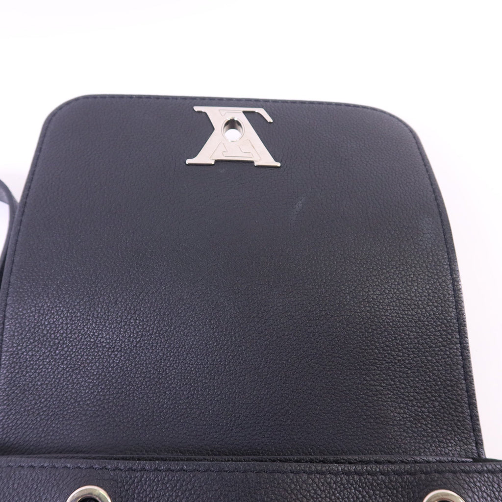 Louis Vuitton Lock Me · Calfskin Backpack