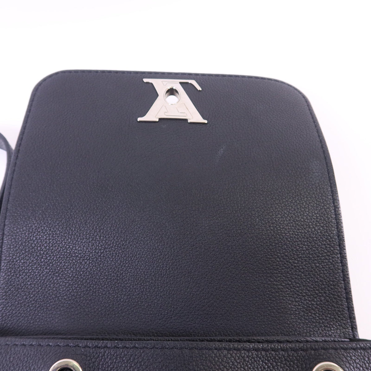 Louis Vuitton Lock Me · Calfskin Backpack
