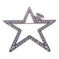 Chanel CC Brooch · Metal