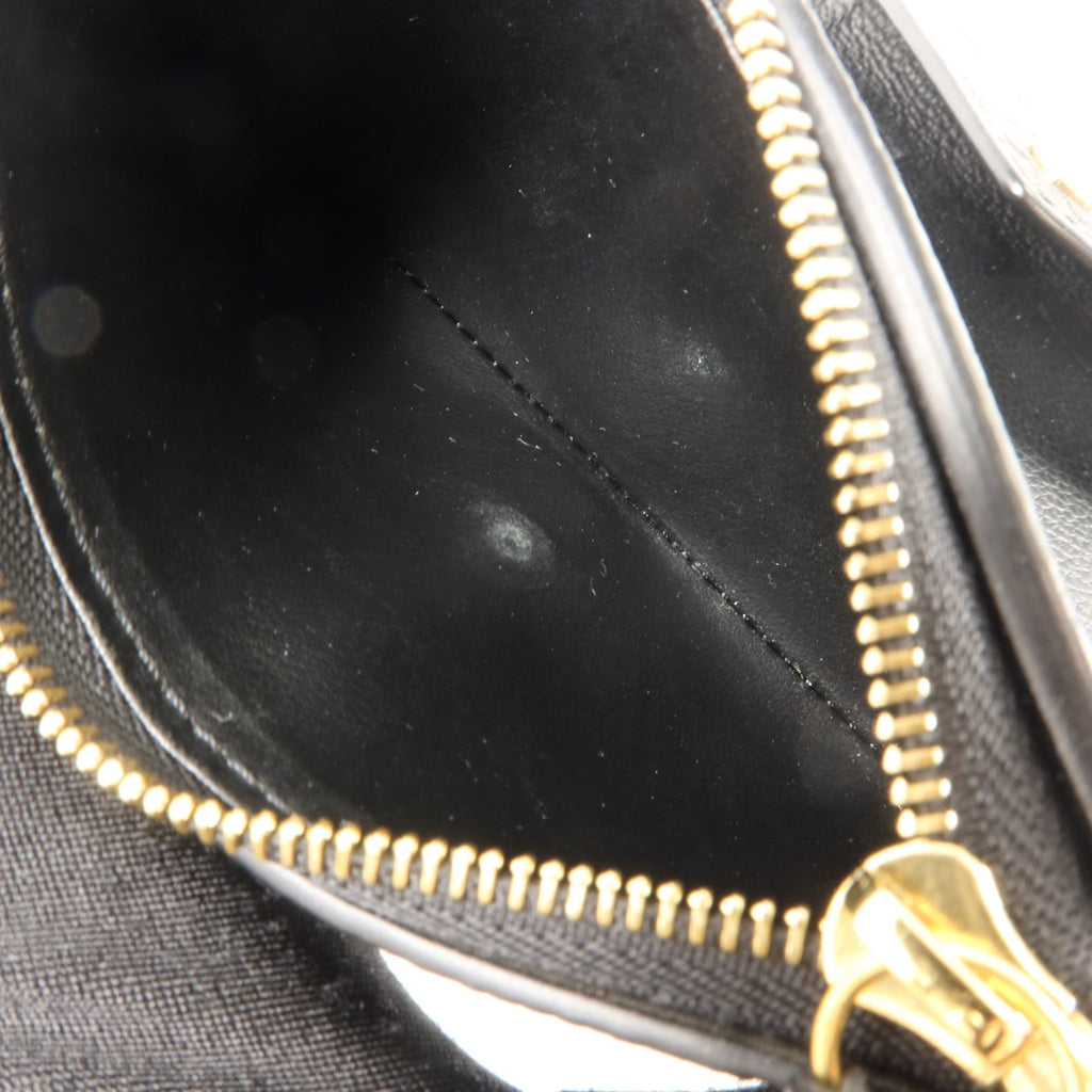 Louis Vuitton Victorine · Monogram Empreinte
