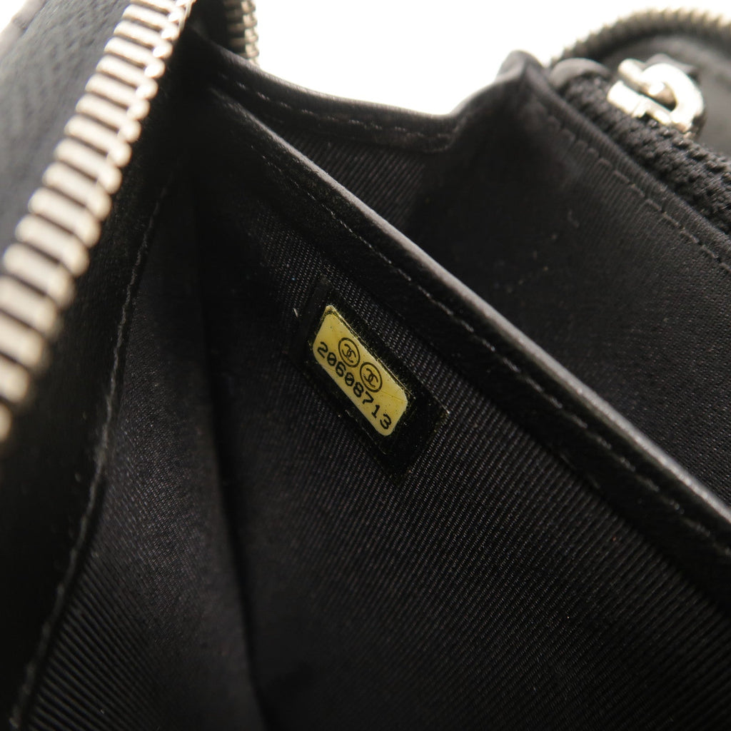 Chanel · Lambskin Zip Wallet