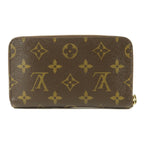 Louis Vuitton · Monogram Zip Wallet