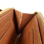 Louis Vuitton · Monogram Zip Wallet