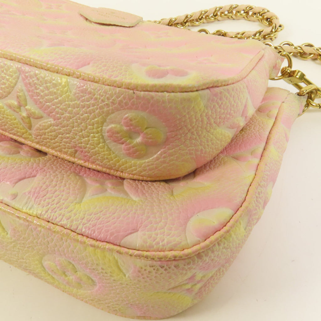 Louis Vuitton Pochette · Monogram Empreinte