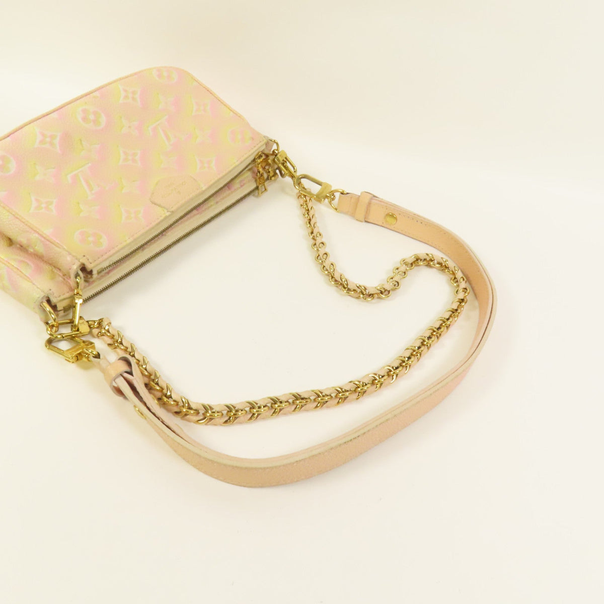 Louis Vuitton Pochette · Monogram Empreinte