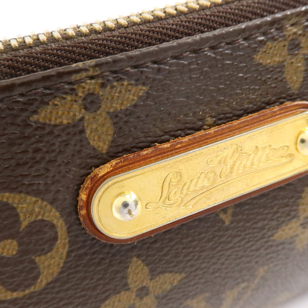 Louis Vuitton Pochette Milla · Monogram