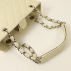 CHANEL Petite Shopping Tote · Calfskin