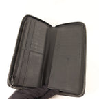 Louis Vuitton Zippy Vertical · Taurillon