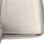 Louis Vuitton Zippy Vertical · Taurillon