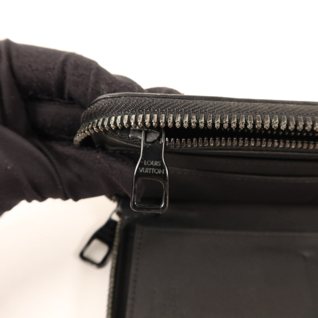 Louis Vuitton Zippy Vertical · Taurillon