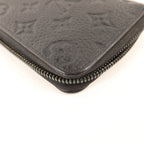 Louis Vuitton Zippy Vertical · Taurillon