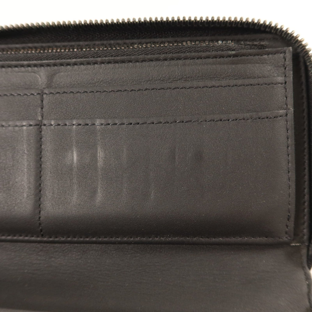 Louis Vuitton Zippy Vertical · Taurillon