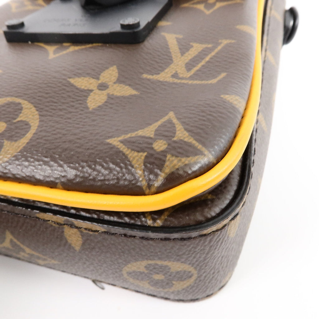 Louis Vuitton S-Lock Vertical · Monogram