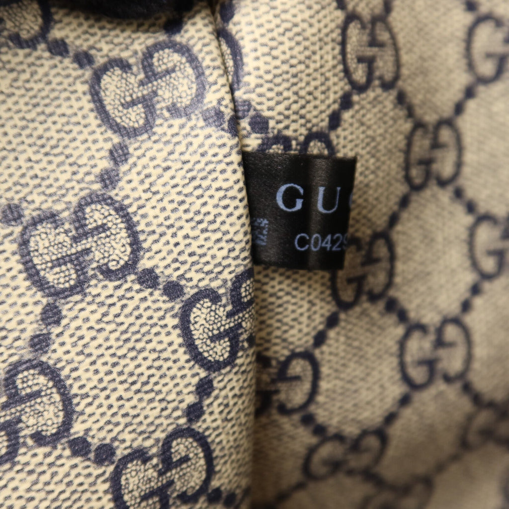 Gucci GG Tote · Coated Canvas