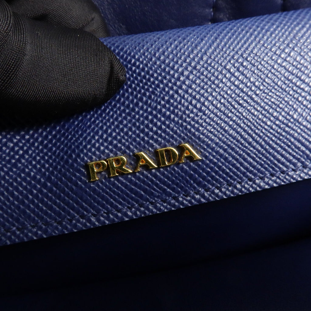 Prada · Calfskin & Canvas
