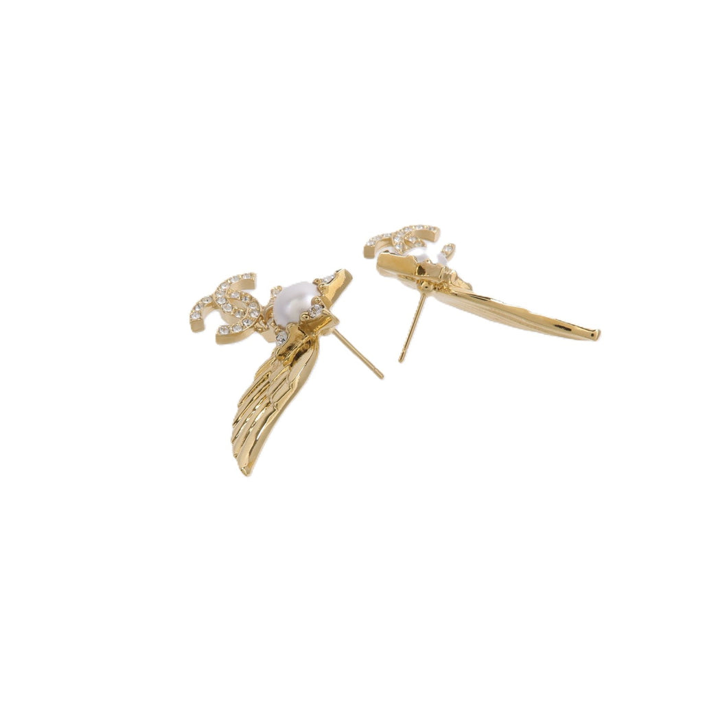 Chanel CC Wing Earrings · Gold Tone