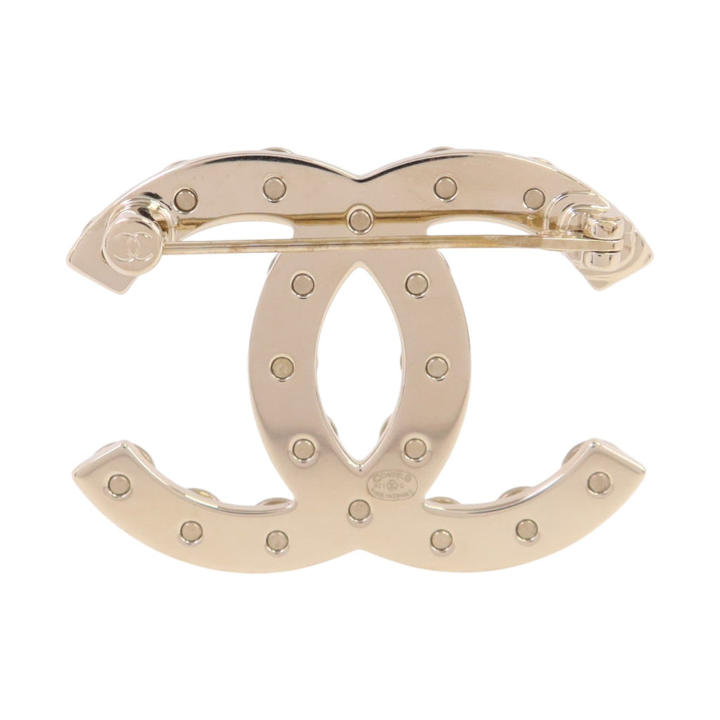 Chanel CC Brooch · Metal & PVC