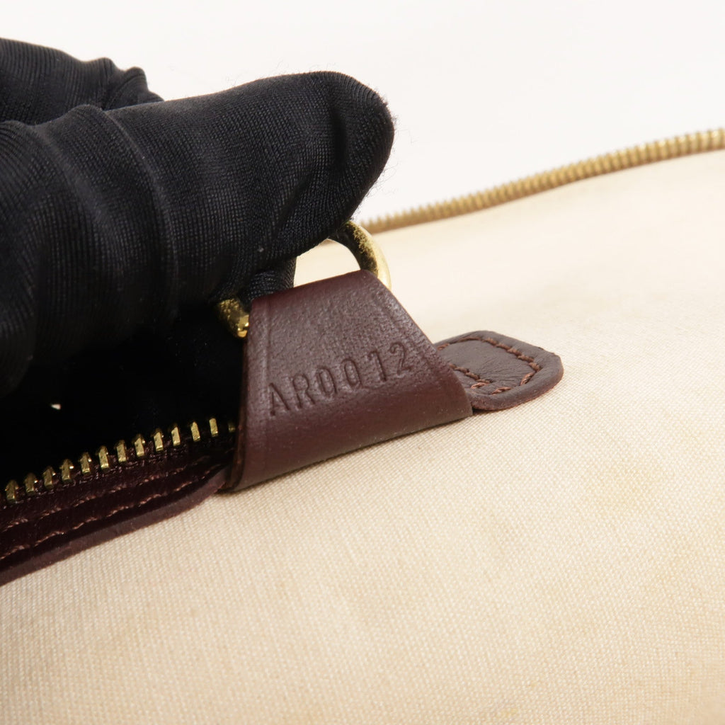 Louis Vuitton Alma Haut · Mini Monogram