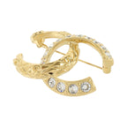 Chanel CC Brooch · Metal