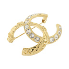 Chanel CC Brooch · Metal