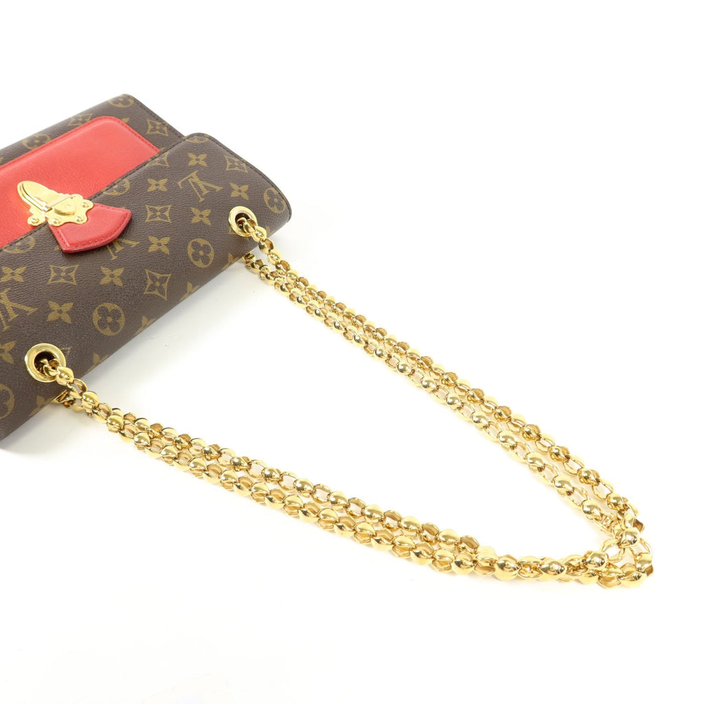 Louis Vuitton Victoire · Monogram Canvas