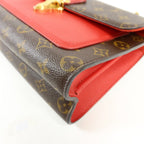 Louis Vuitton Victoire · Monogram Canvas