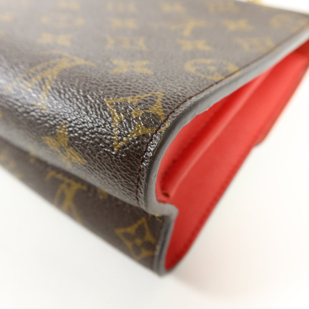 Louis Vuitton Victoire · Monogram Canvas