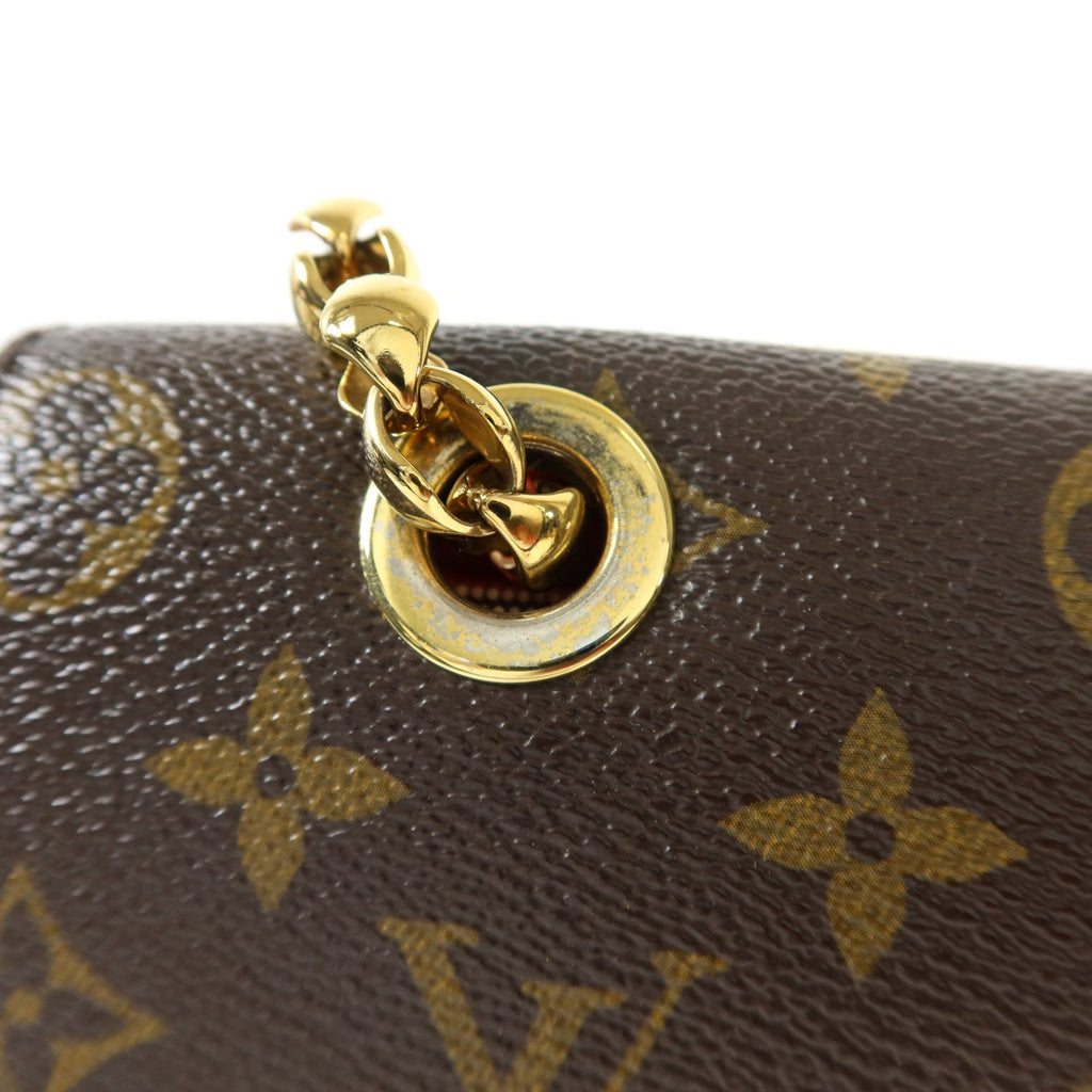 Louis Vuitton Victoire · Monogram Canvas
