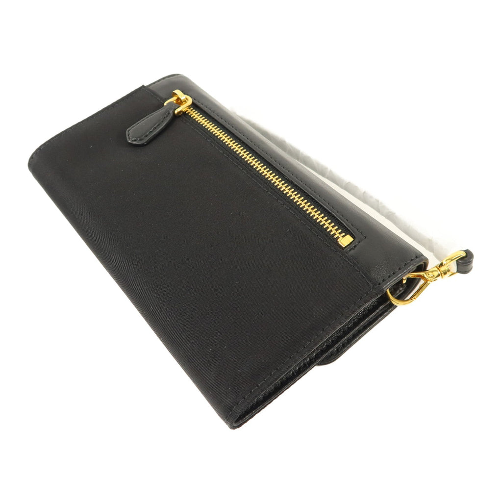 Prada · Calfskin & Nylon Pouch Wallet
