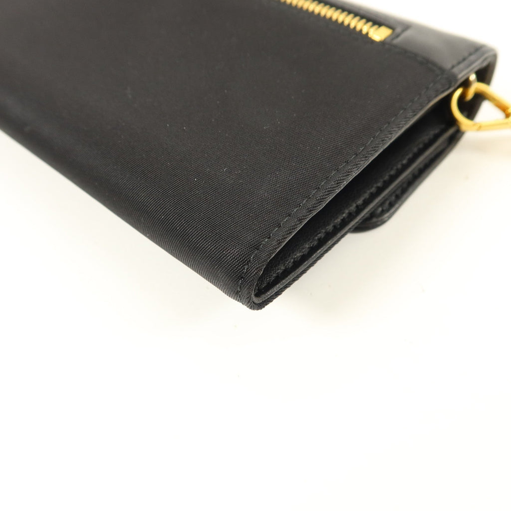 Prada · Calfskin & Nylon Pouch Wallet