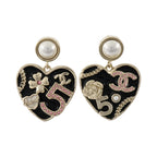 CHANEL CC Earrings · Enamel · PVC