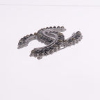 Chanel CC Brooch · Metal