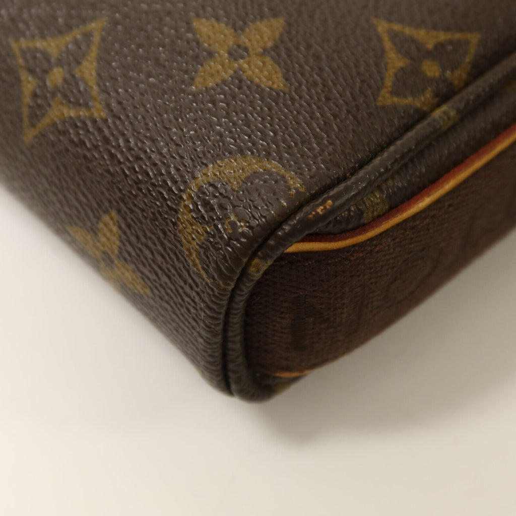 Louis Vuitton Trotteur Beaubourg · Monogram