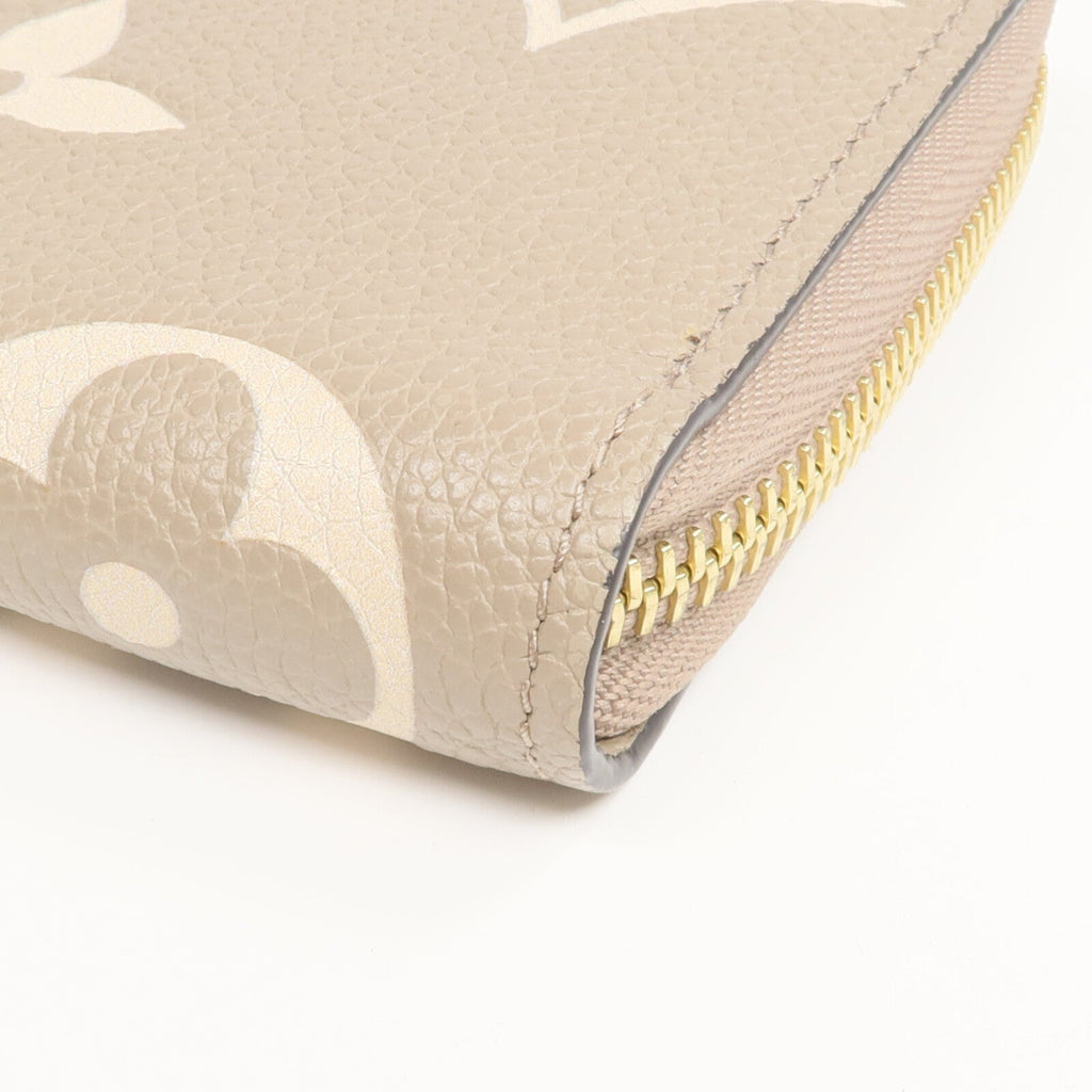 Louis Vuitton Zippy · Monogram Empreinte
